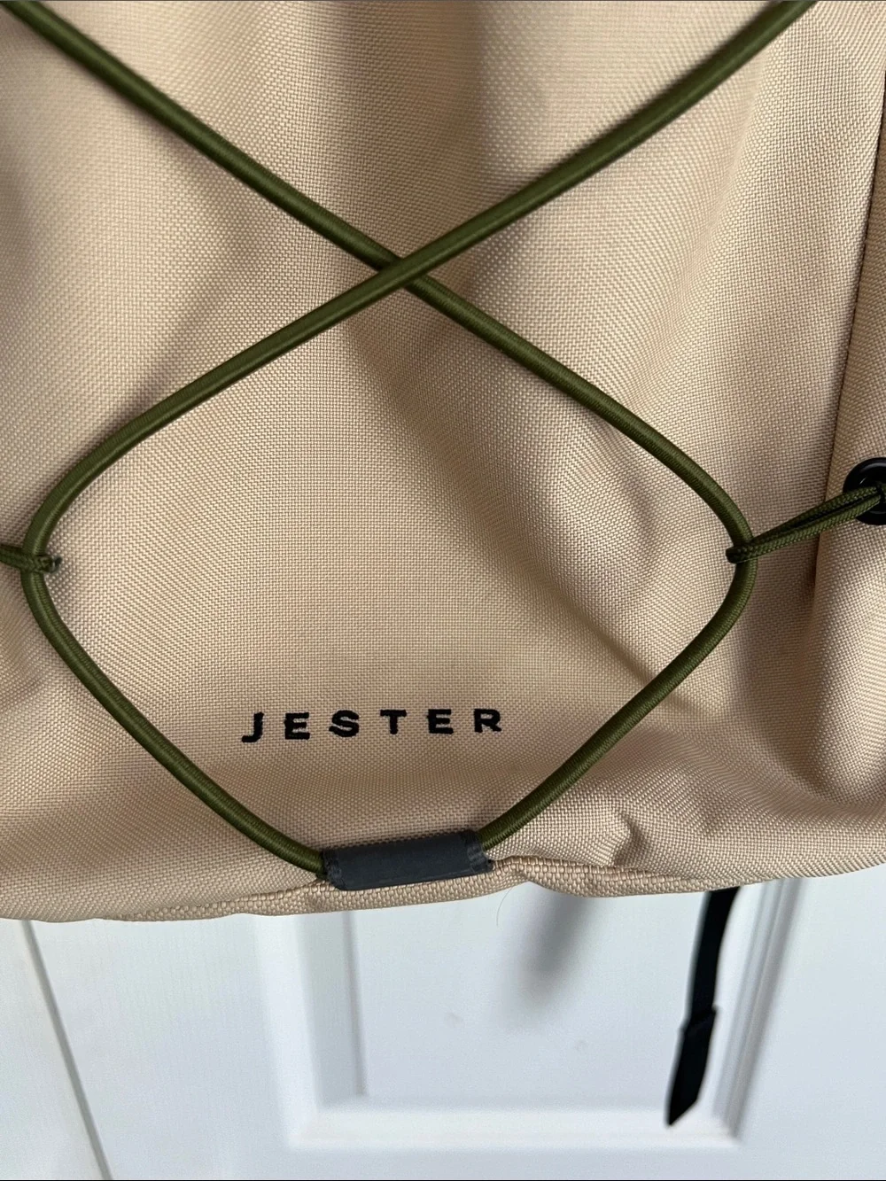 The North Face Jester Backpack in Beige with Olive Bungee